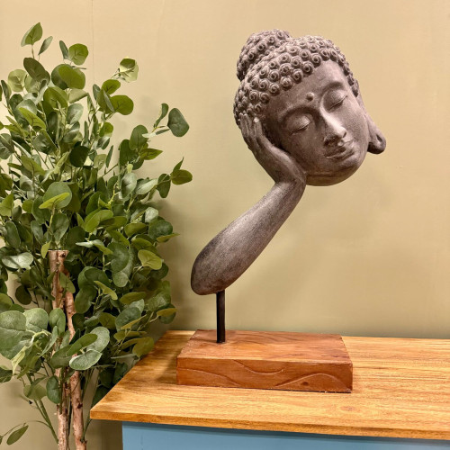 Statue tête Bouddha suspendu