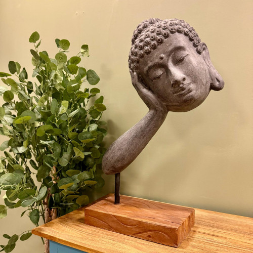 Statue tête Bouddha suspendu